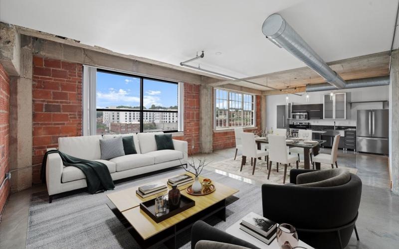 a living room with a couch and a table