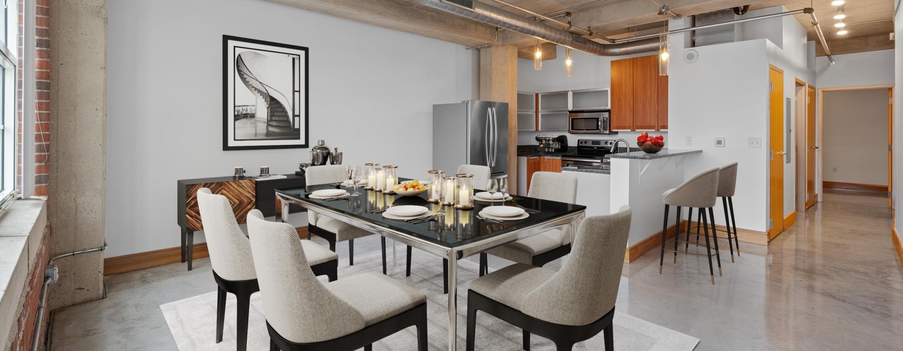 a kitchen with a dining table